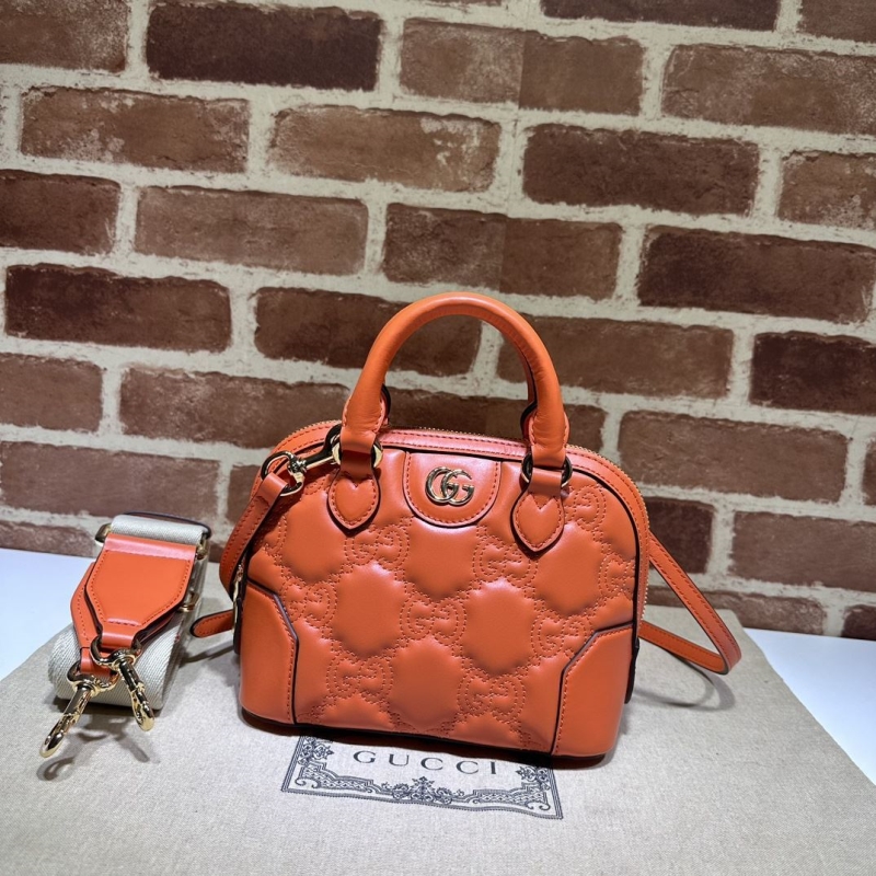 G*u*i top handle bags